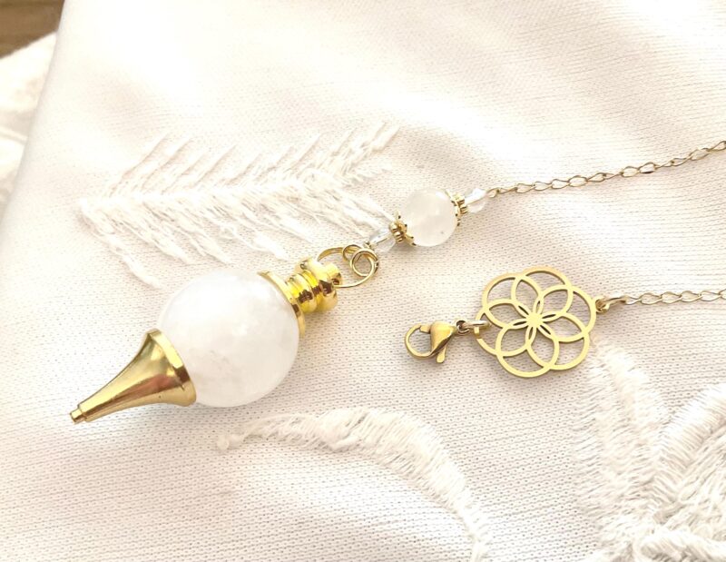 Collier pendule divinatoire - cristal de roche, fleur de vie en acier