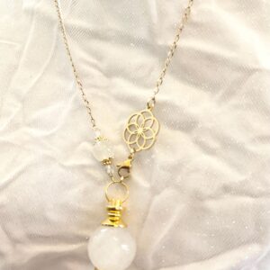 Collier pendule divinatoire - cristal de roche, fleur de vie en acier