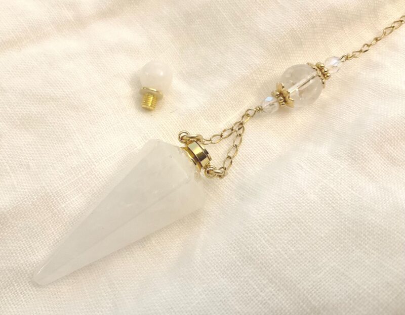 Pendule de divination avec Fiole en Cristal de Roche et Fleur de vie