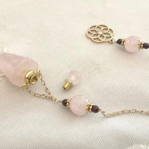 Pendule de divination avec fiole en quartz rose, grenat et fleur de vie