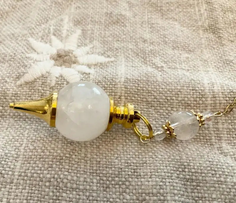 il_fullxfull.7288505675_kvh8 Pendule divinatoire en Cristal de roche et Fleur de vie en acier